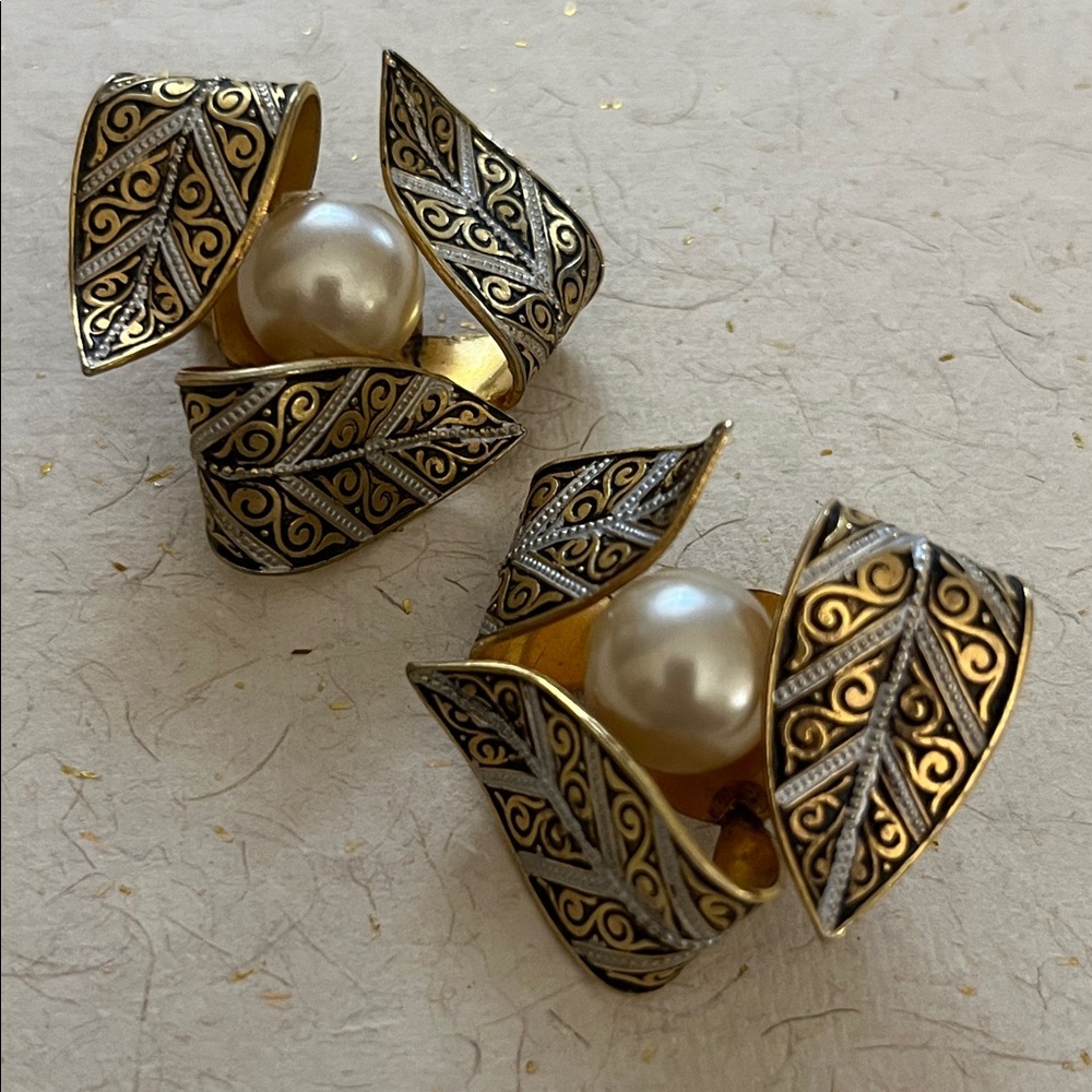 Vintage Spanish Damascene swirling leaf clip earrings with encased faux pearls